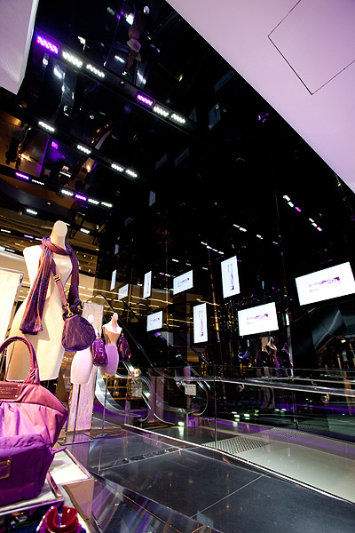 displays along the first floor escalator