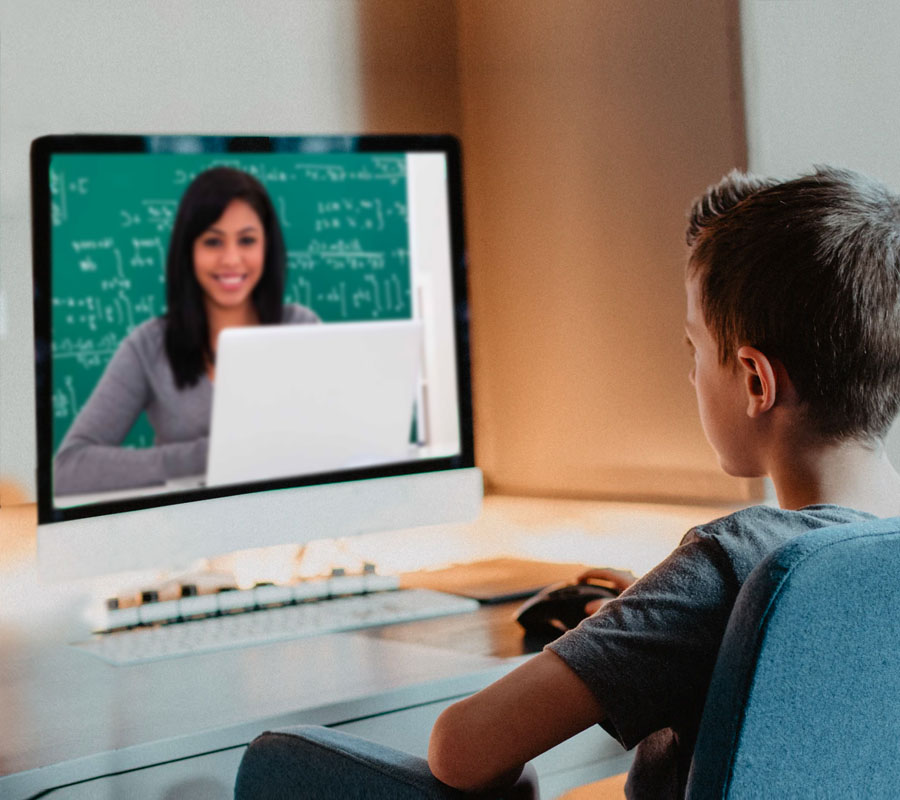 Student watching an online class at home