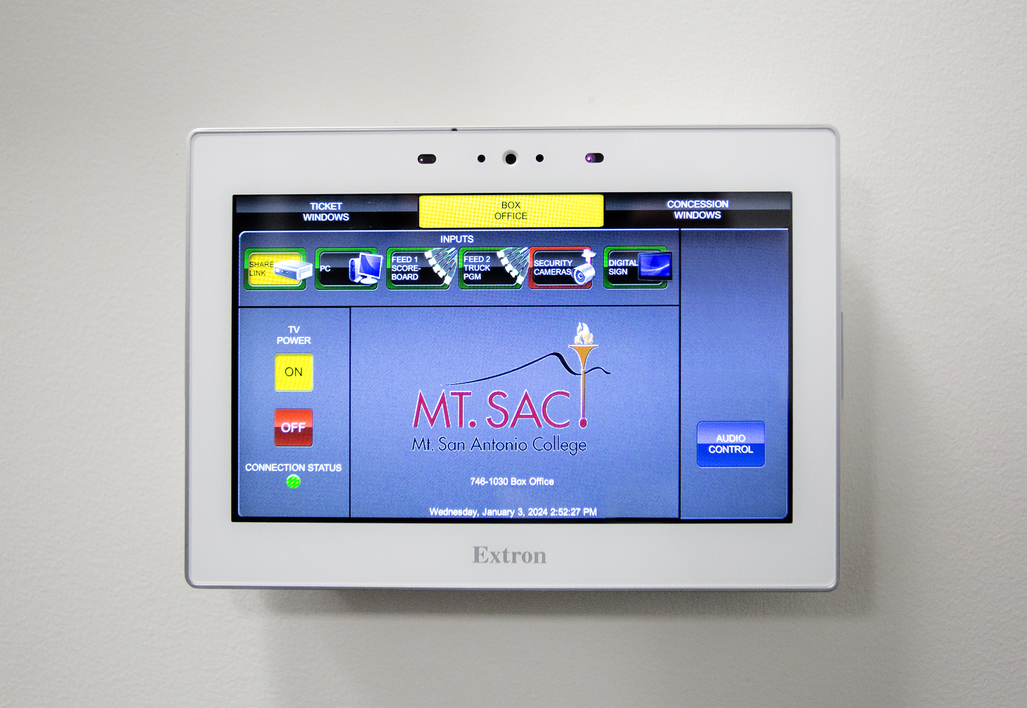 Displays at the ticket booth and within the concessions area can be controlled from the 10" TouchLink Pro touchpanel mounted to the wall in the operations room.