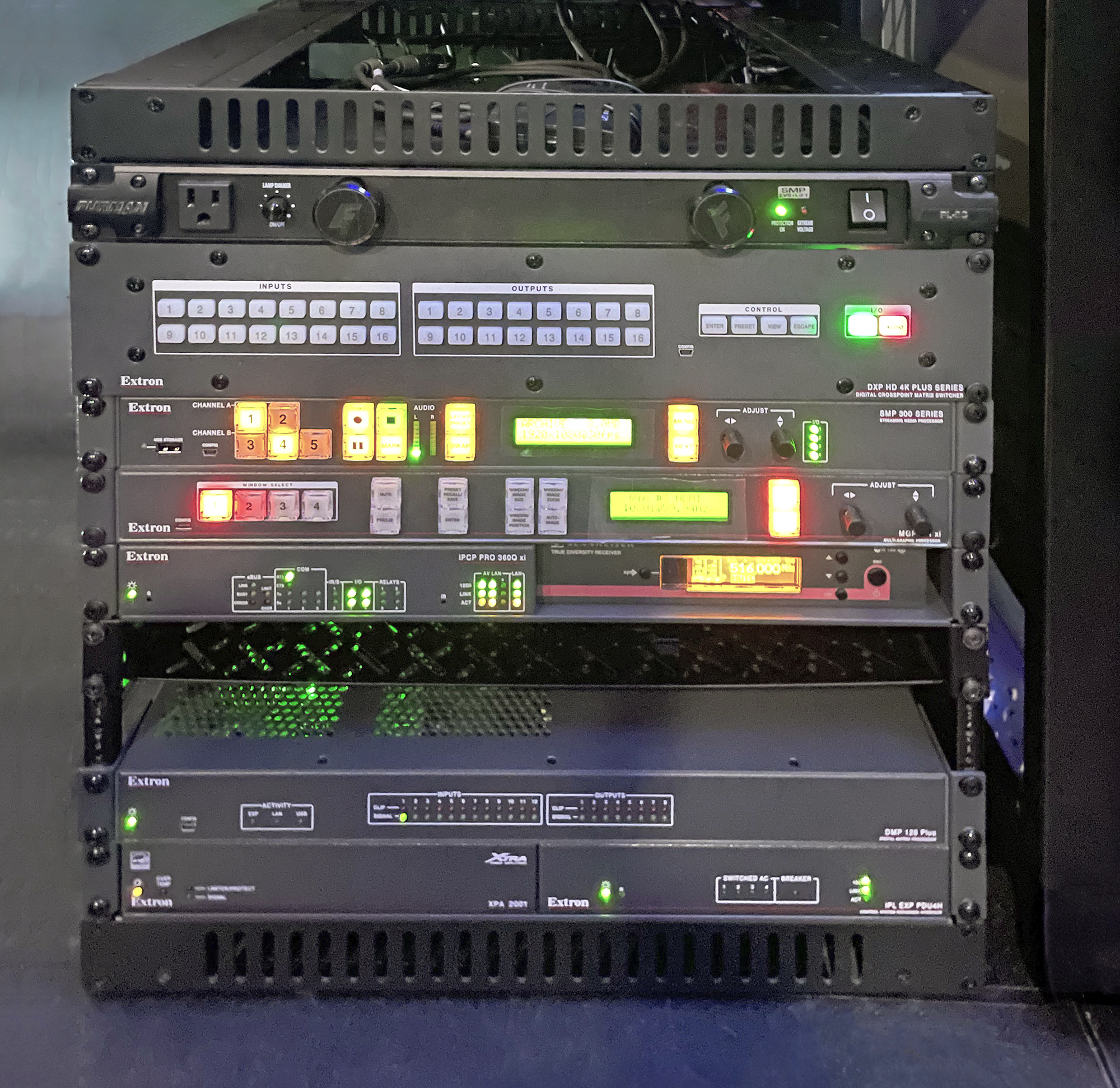 Esports facility AV equipment rack is located under the Production Booth table.