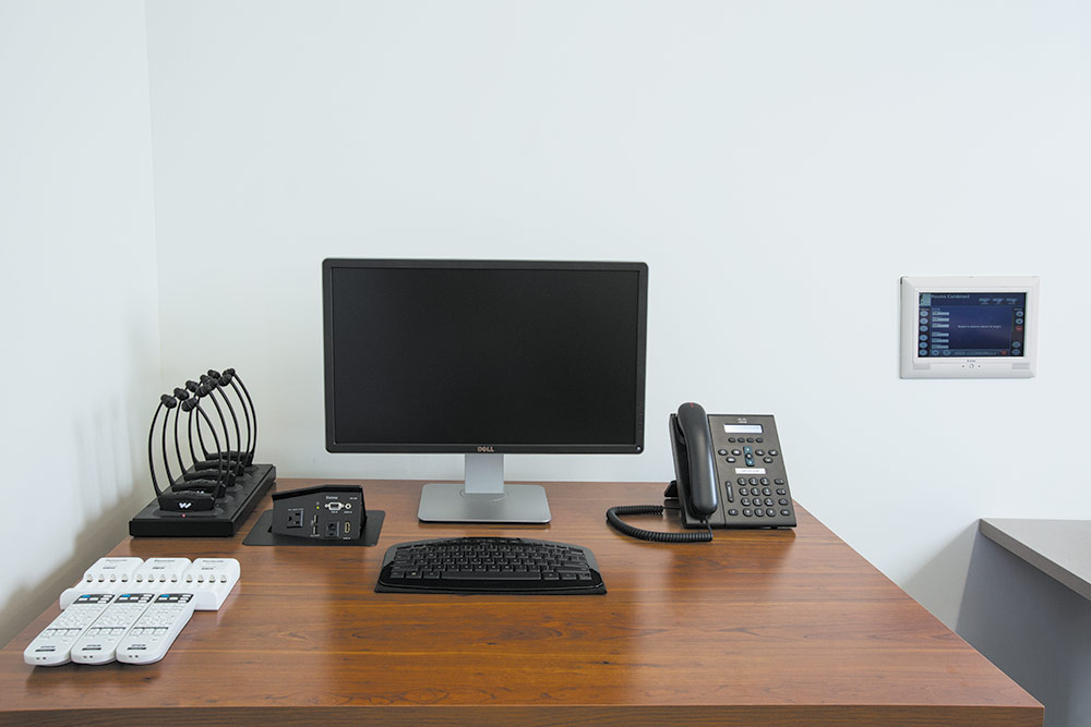 A credenza with AV equipment