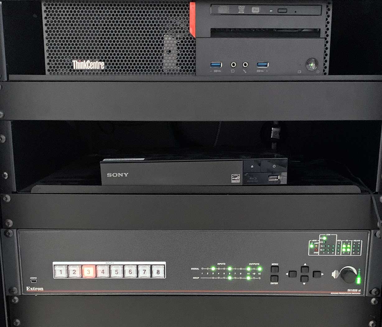 AV Podium base houses AV switching and control equipment.