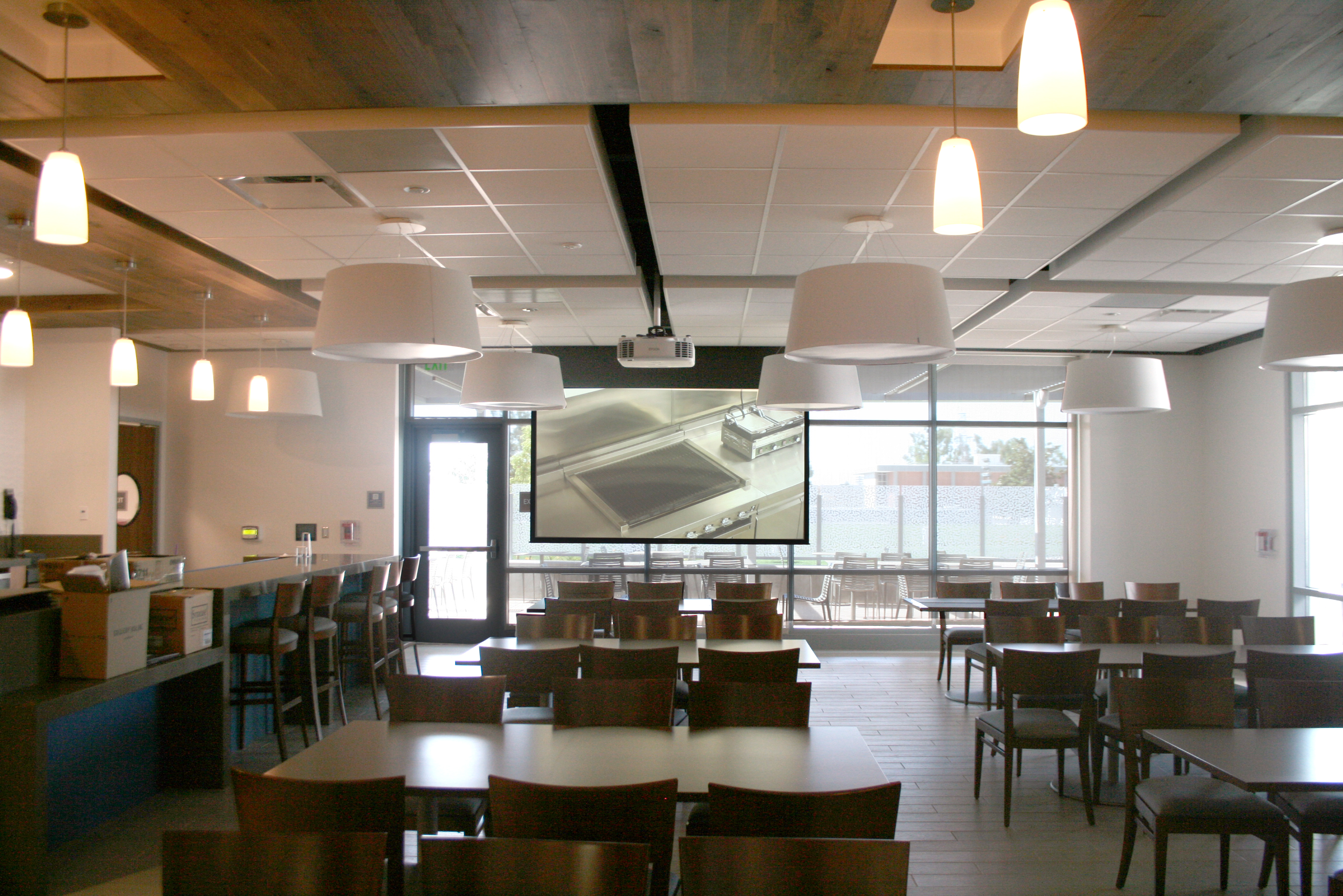 Culinary classroom with projector displaying live feeds from the PTZ camera system