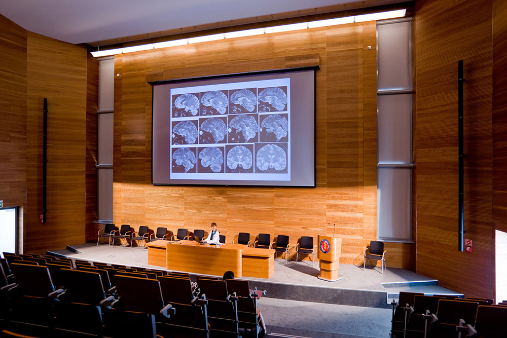 Content can be shared throughout the facility, including in the auditorium for larger audiences.