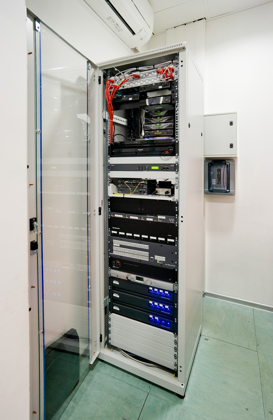 AV equipment for the auditorium is rack-mounted in the control room.