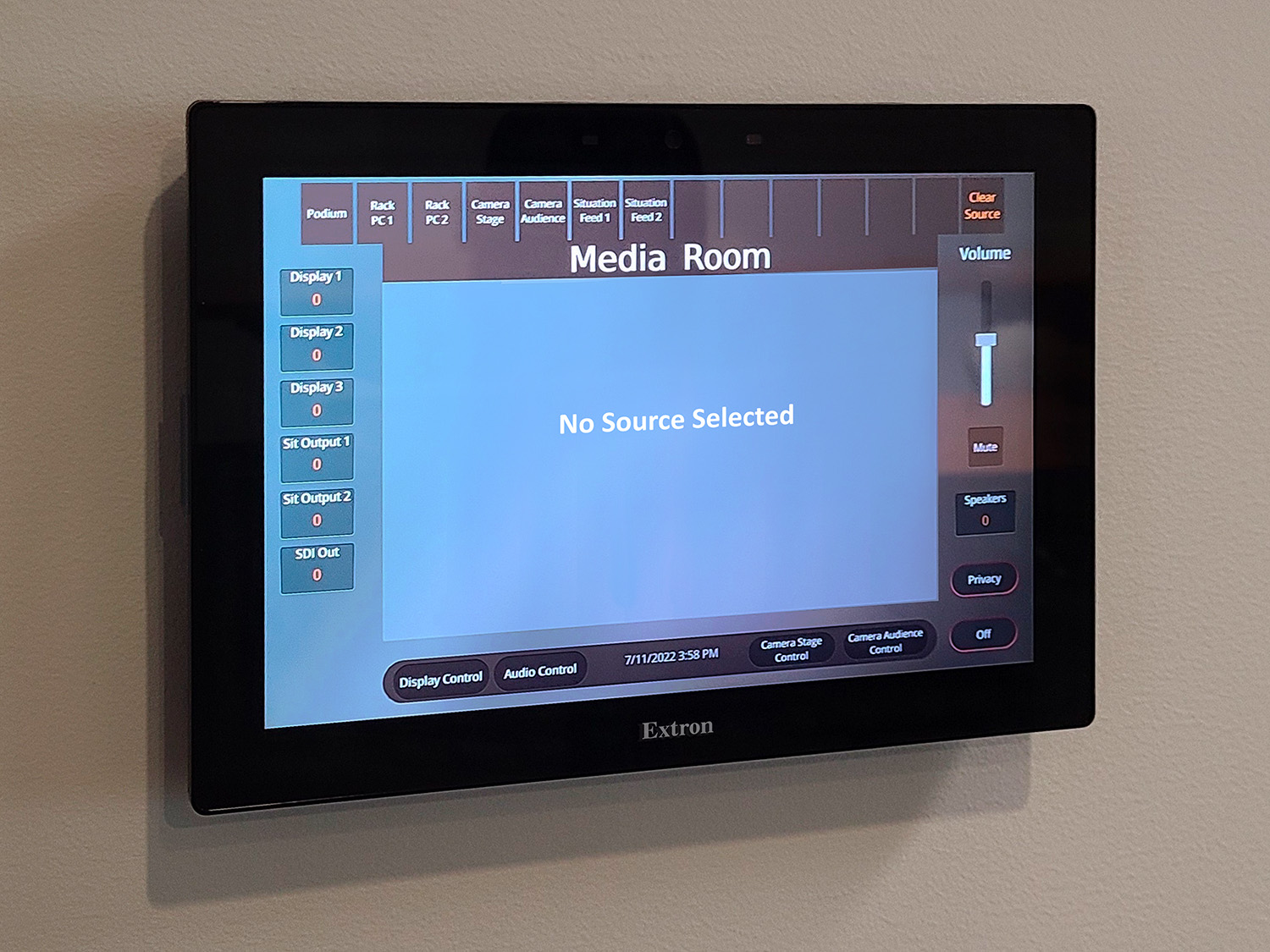 TouchLink Pro touchpanels with an intuitive user interface such as this 10" wall-mount model in the Media Room facilitate easy selection of sources and display devices within the space.