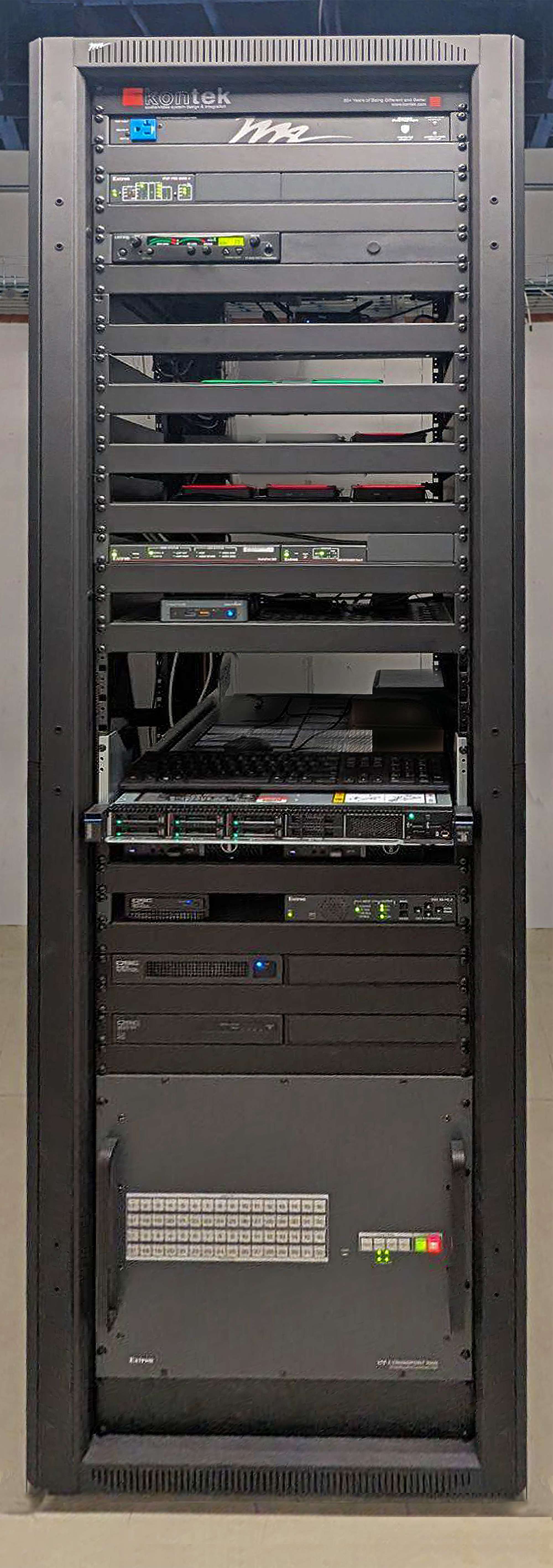 Equipment rack featuring Extron Pro Series Control and an XTP II CrossPoint 3200 modular matrix switcher with a 50 Gbps digital backplane, essential for maintaining smooth AV function.