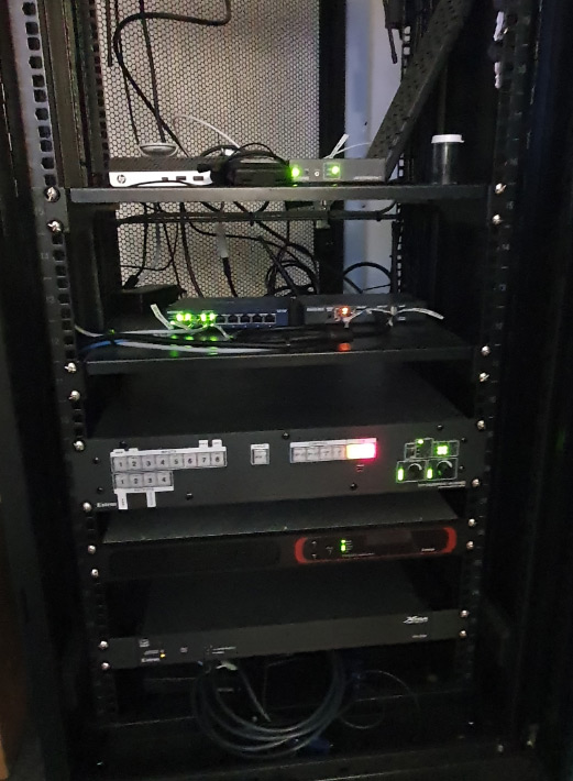 A single DTP CrossPoint 4K scaling presentation matrix switcher facilities AV and control signal routing for breakout and social hubs.