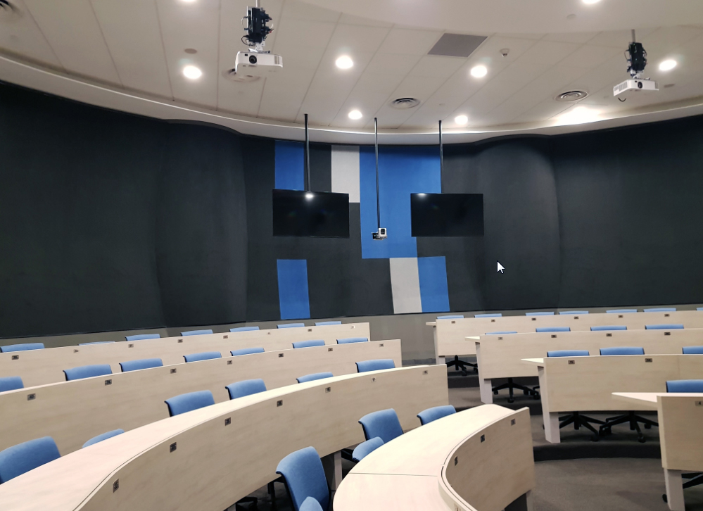 Classroom with projectors hanging from the ceiling