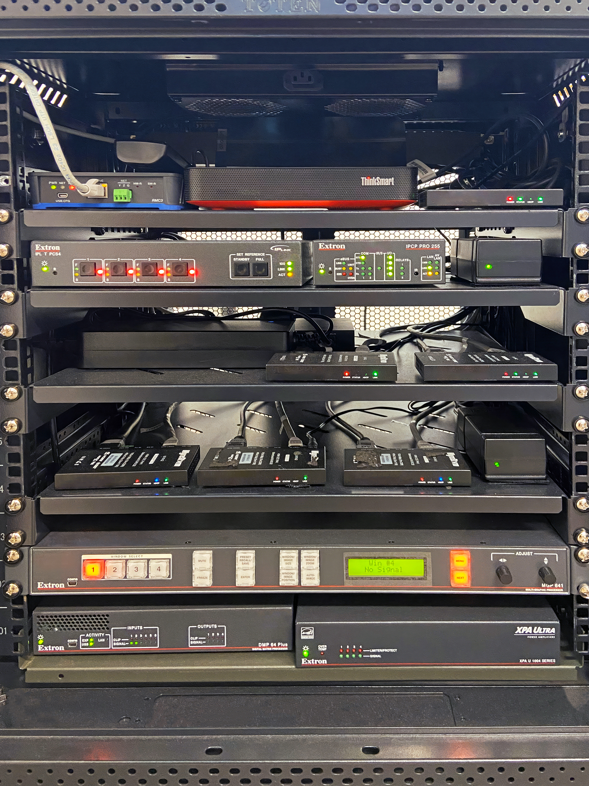 The central AV components of the HyFlex AV system fit inside the lectern. An IPL T PCS4i power control unit turns all HyFlex classroom AV system components on and off in response to user commands from the lectern touchpanel.