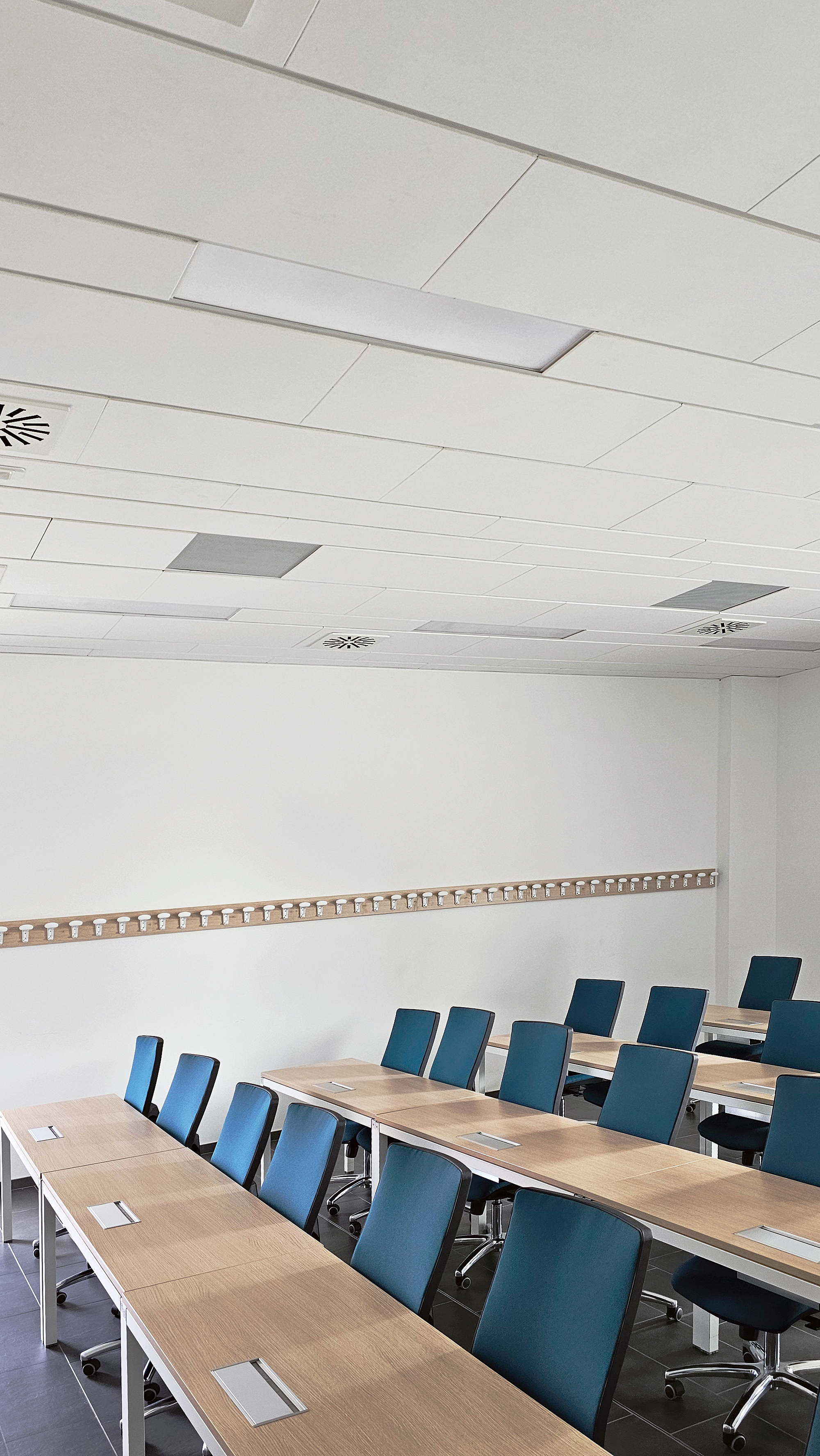 Extron FF 220T ceiling speakers provide a very wide room coverage pattern throughout the library.