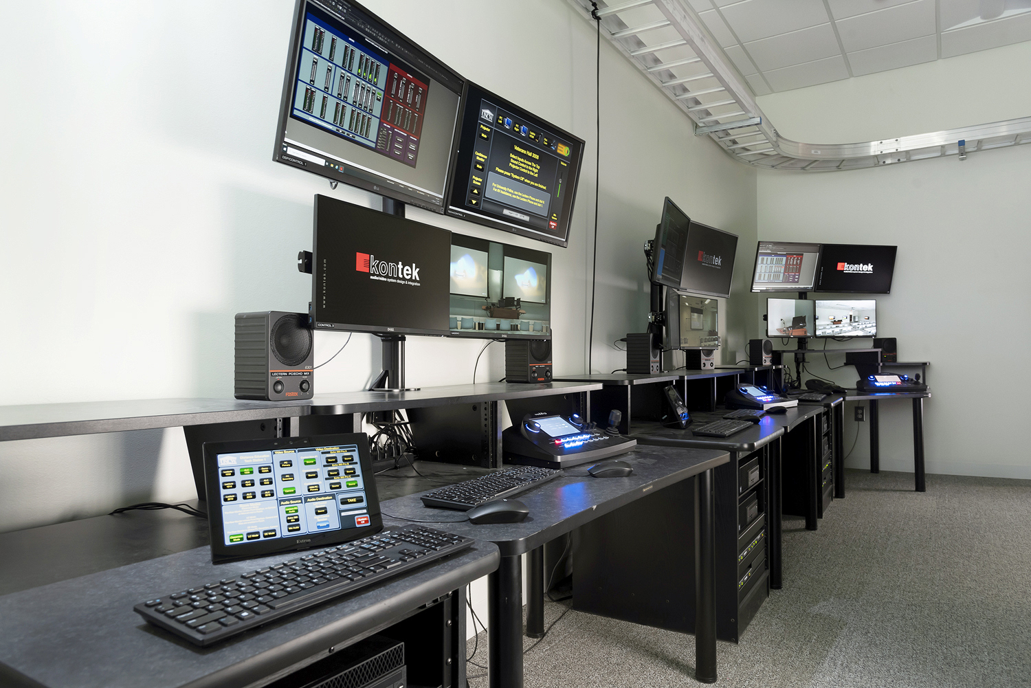 Veterans Hall Control Room with three stations for monitoring classrooms