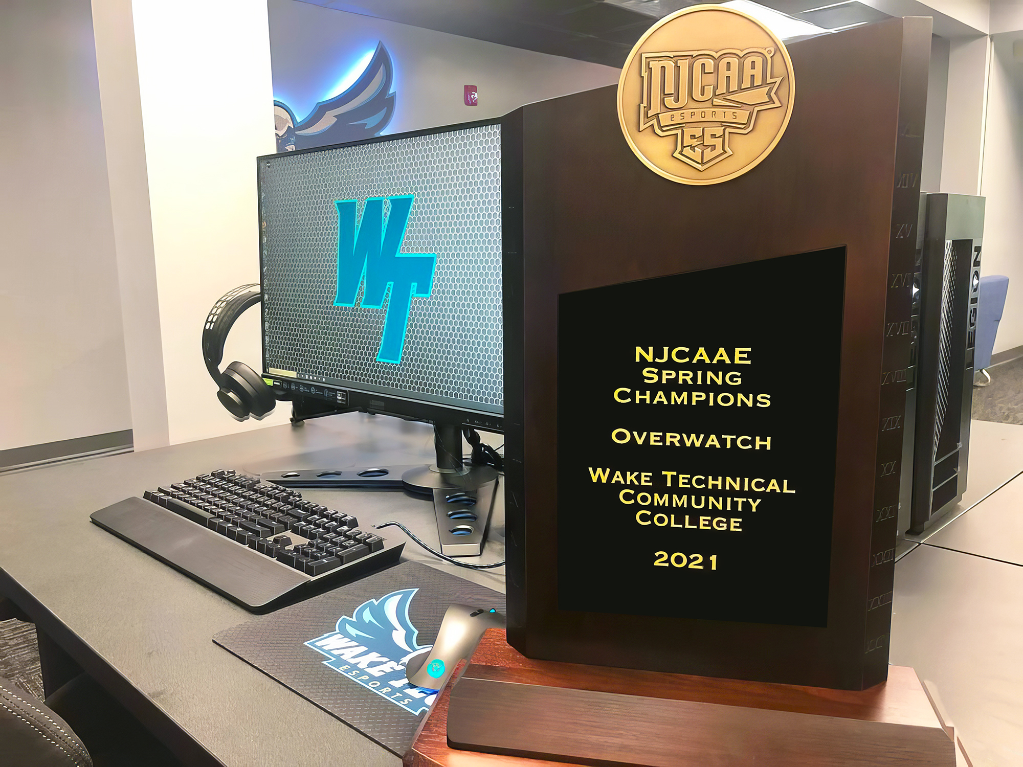 This trophy commemorates the Eagles' first national win in 2021. They won again in 2022, playing League of Legends. They extended the winning streak in 2023, taking first place in the League of Legends Premier Series Championship.