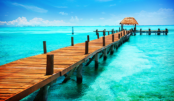 A pier in clear turquoise ocean