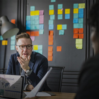 A businessman using YuJa.